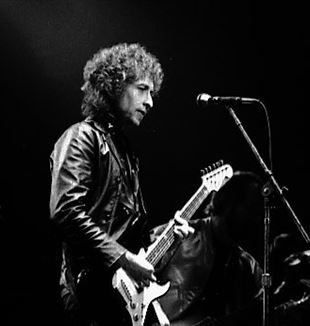 Bob Dylan at Massey Hall, Toronto, 1980 Photo by Jean-Luc Ourlin via Wikimedia Commons