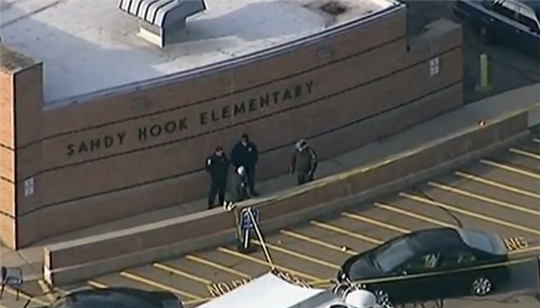 Police arrive at Sandy Hook Elementary. Photo by VOA via Wikimedia Commons