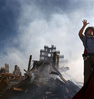 Fireman among the rubble from the Twin Towers. Wikimedia Commons
