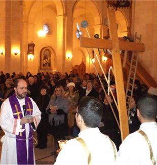 Fr. Ibrahim Alsabagh celebrates mass.