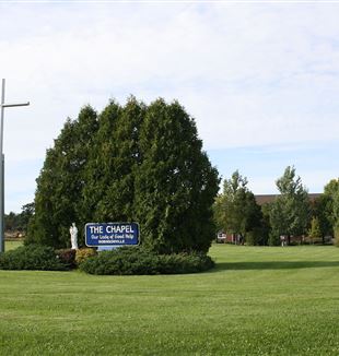 Our Lady of Good Help sign in Champion, WI. Wikimedia Commons