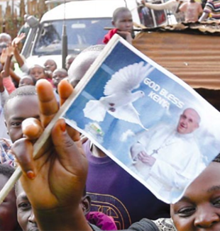 People wait for Pope Francis in the outskirts of Nairobi, Kenya. 