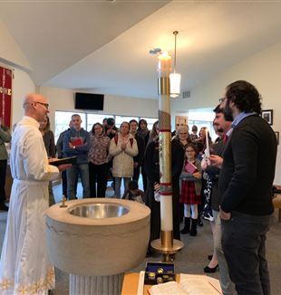The baptism celebrated at the Lower Midwest Advent Retreat