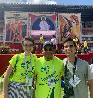 From left, Liv Martin (USA), Justo Lopez (Mexico), and Jose Guillermo (Panama) waiting for Pope Francis at the WYD Volunteers' Meeting.