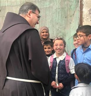 Fr. Firas Lutfi with the children of Aleppo