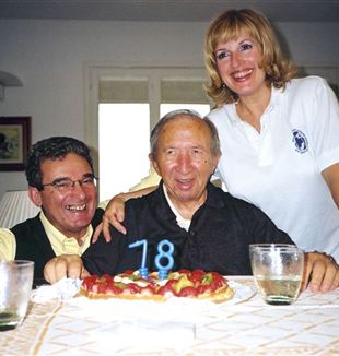 Carras and wife Jone with Fr. Giussani on his 78th birthday (CL Fraternity Archive)